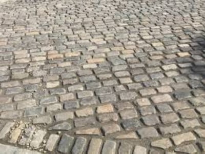 Telford Paving Contractors Laying Cobblestones in Telford 