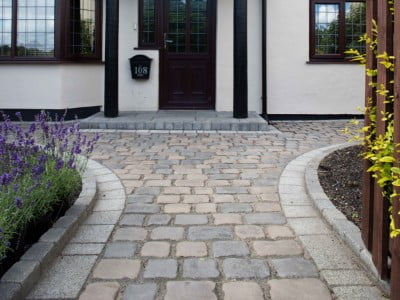 Telford Paving Contractors Laying Cobblestones in Telford 